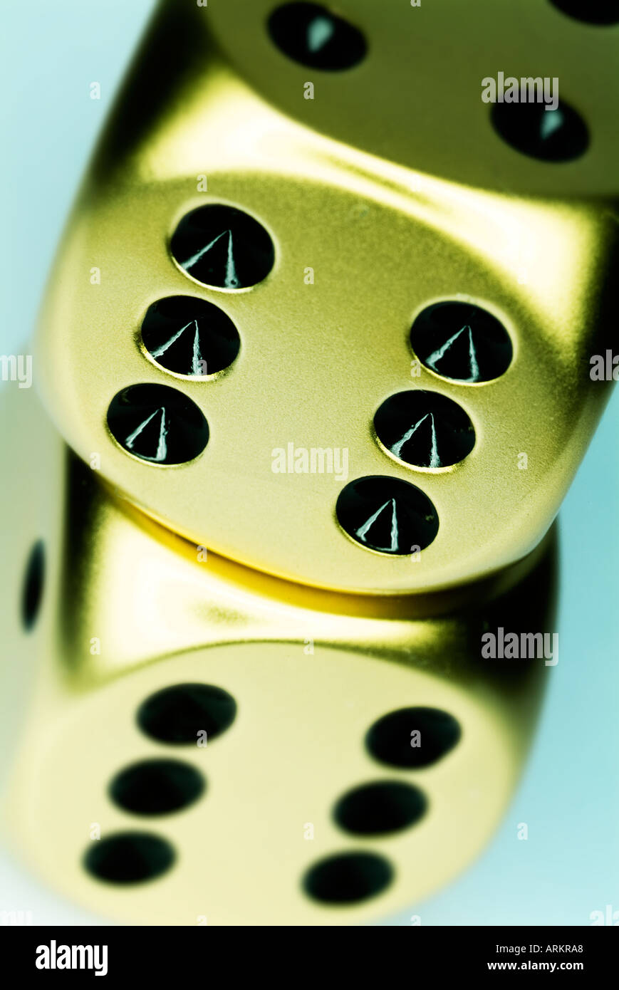 two gold dice Stock Photo
