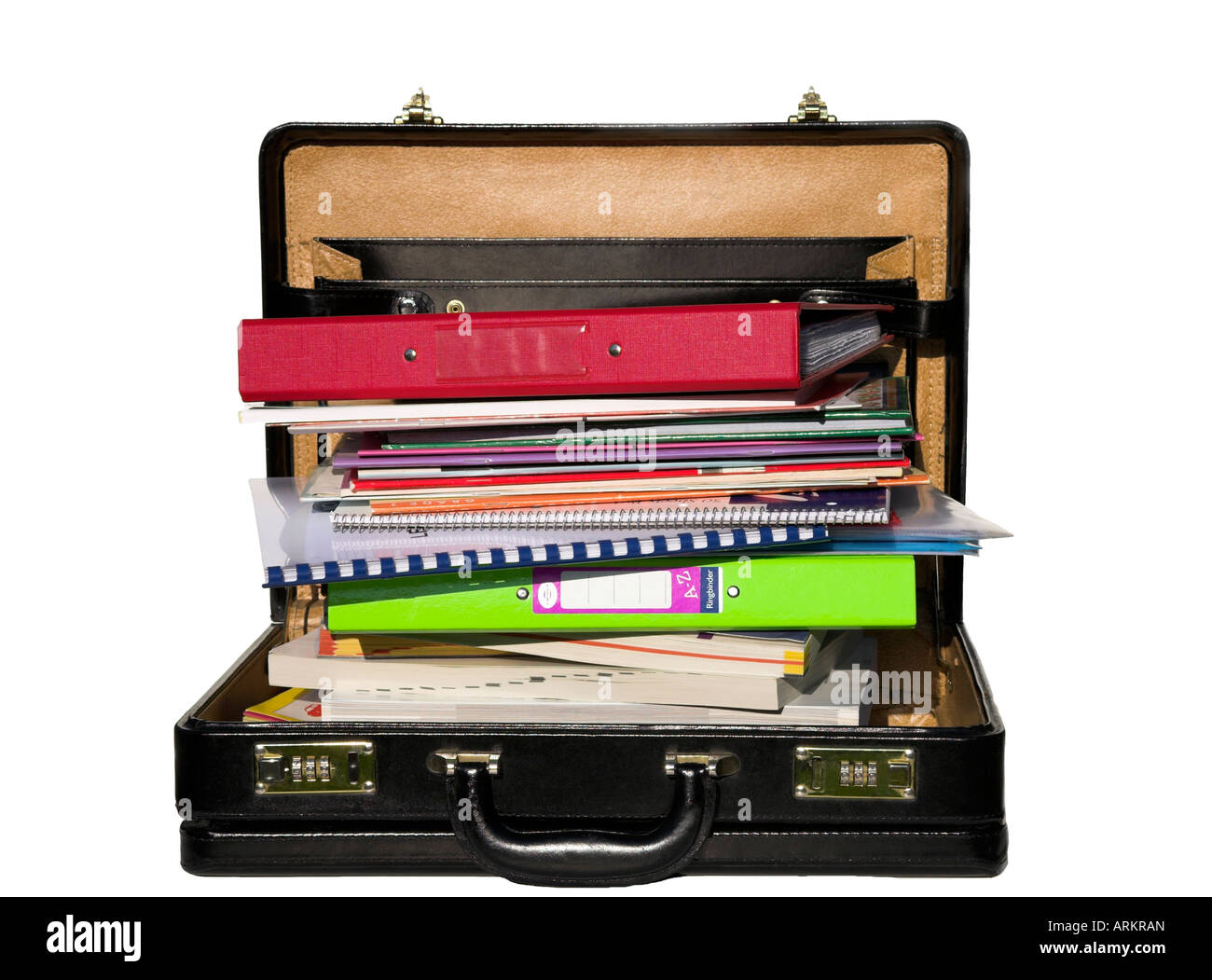 Open briefcase piled high with documents. Stock Photo