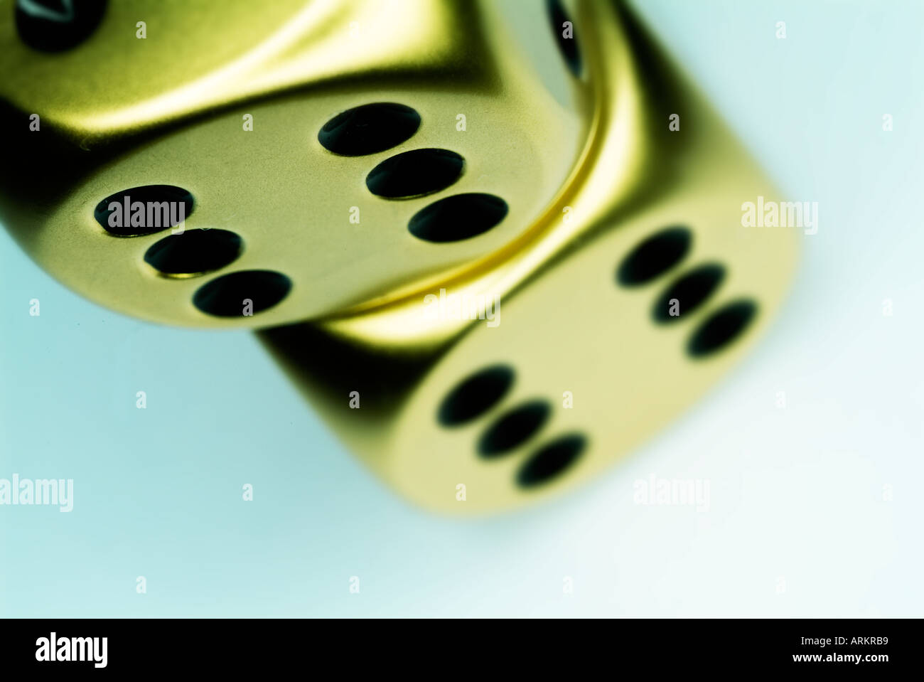 two gold dice Stock Photo