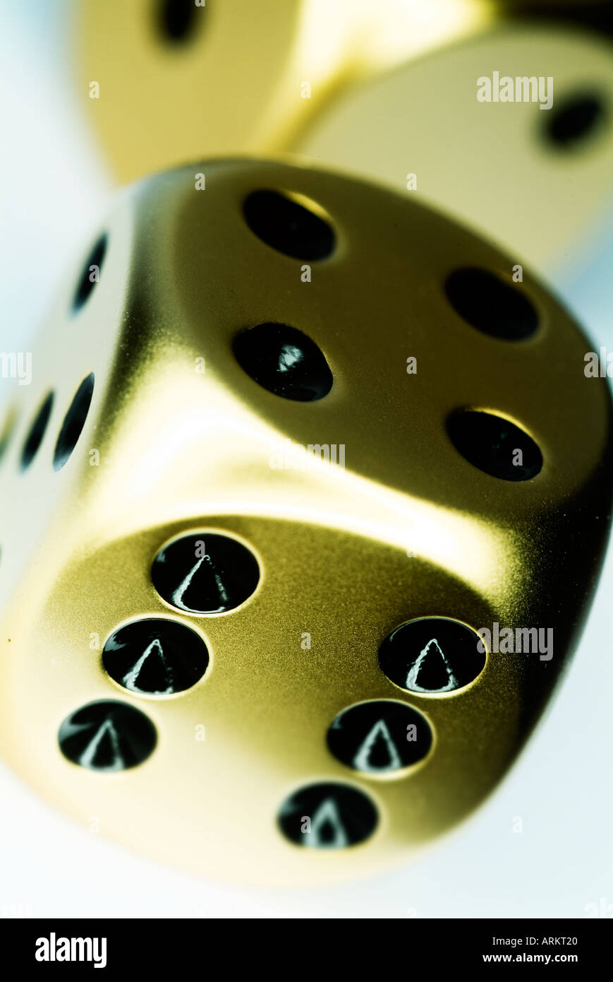 two gold dice Stock Photo