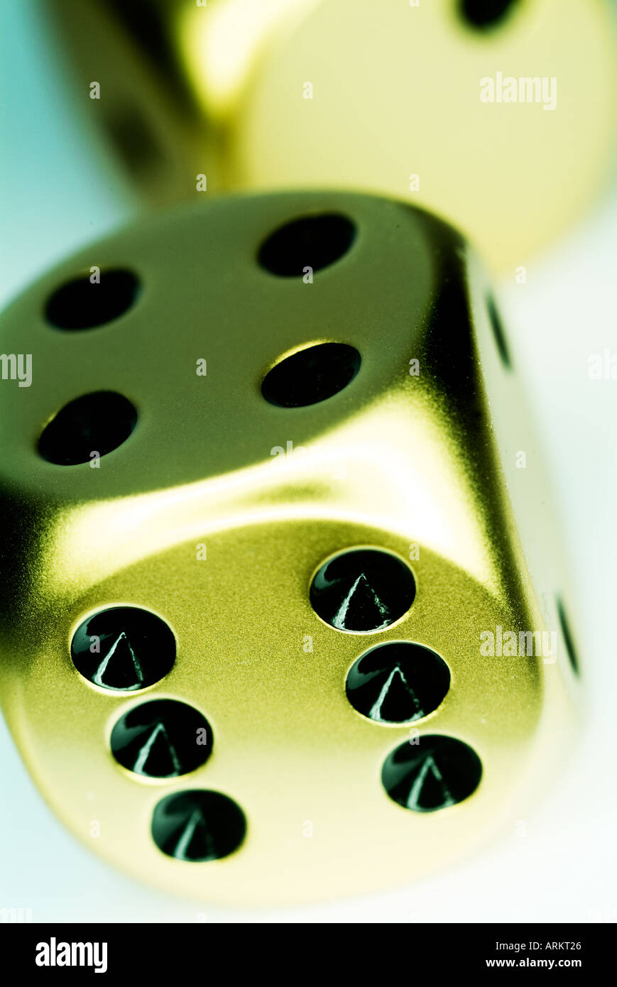 two gold dice Stock Photo