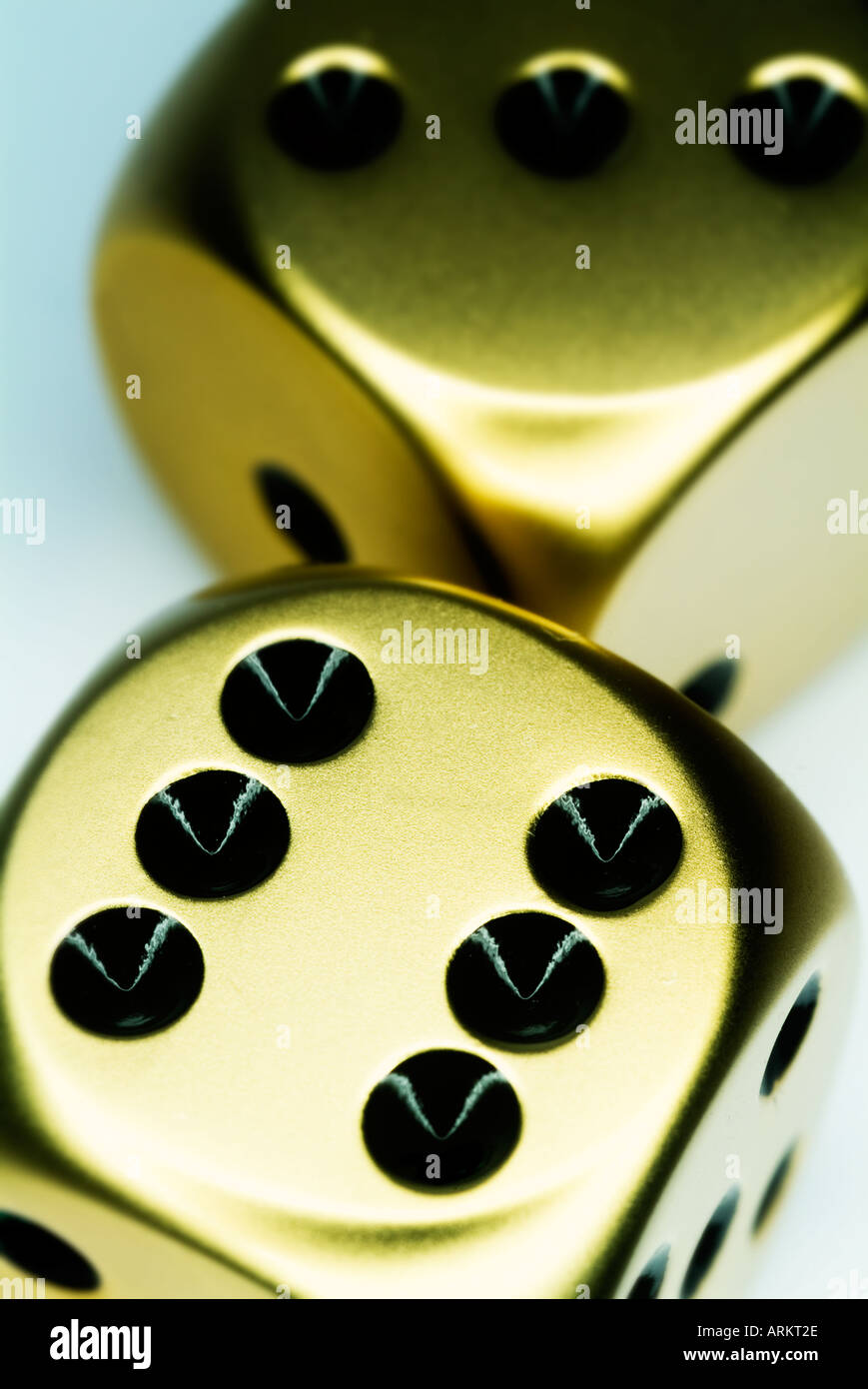 two gold dice Stock Photo