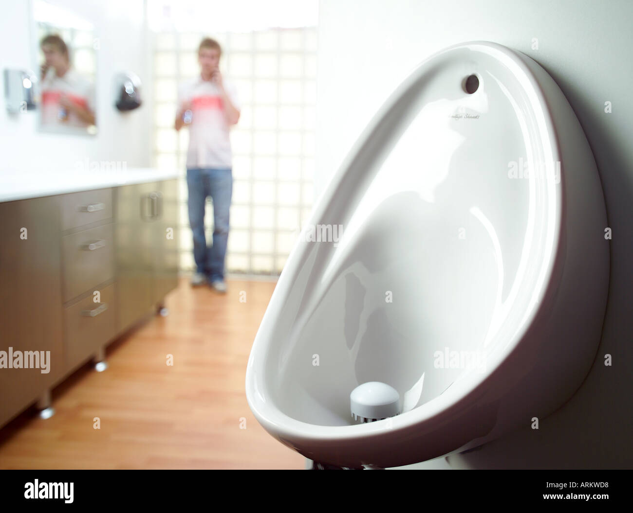 Close up of urinal in men's restroom Stock Photo Alamy