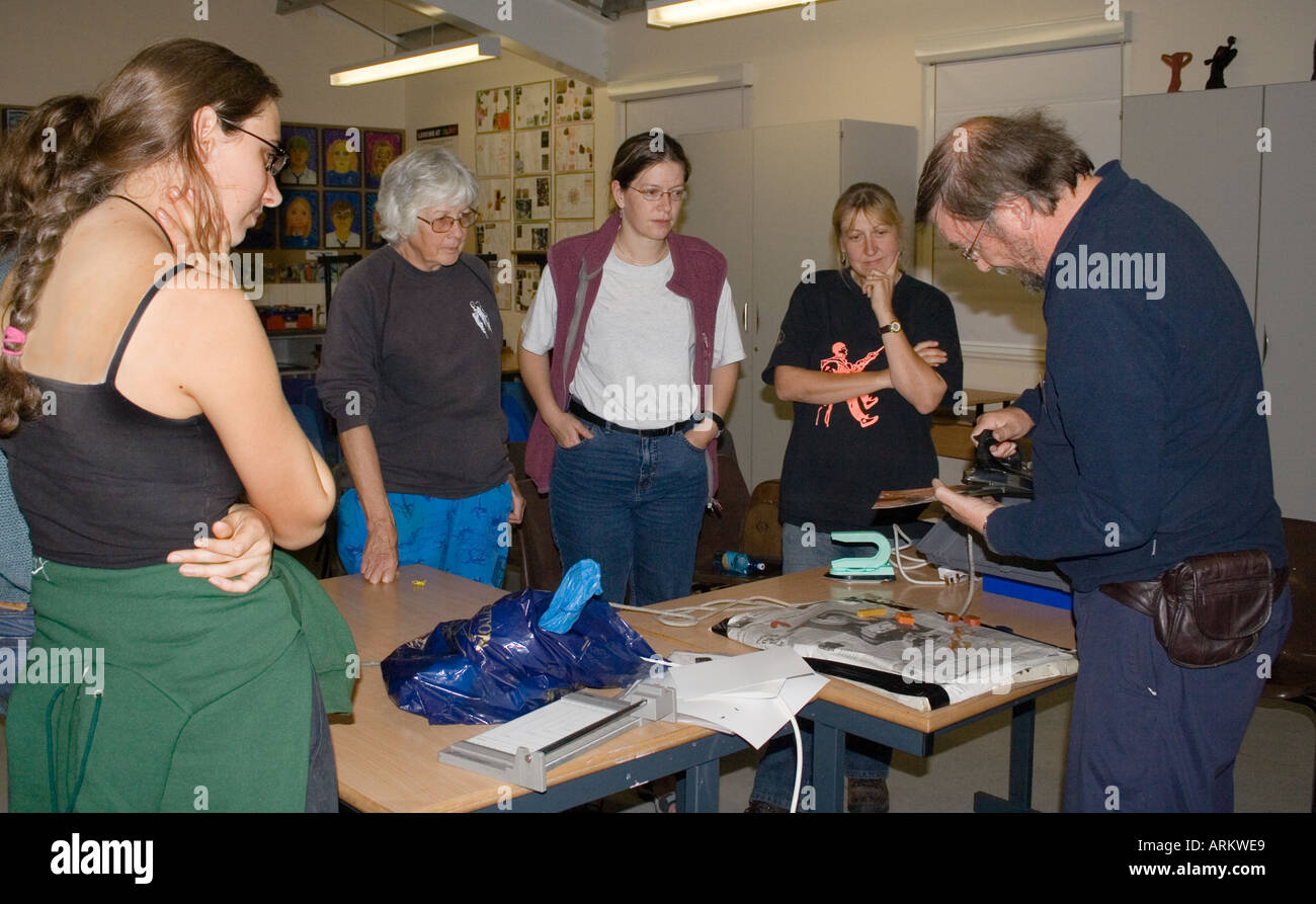 Students watching an art demonstration and workshop England Stock Photo