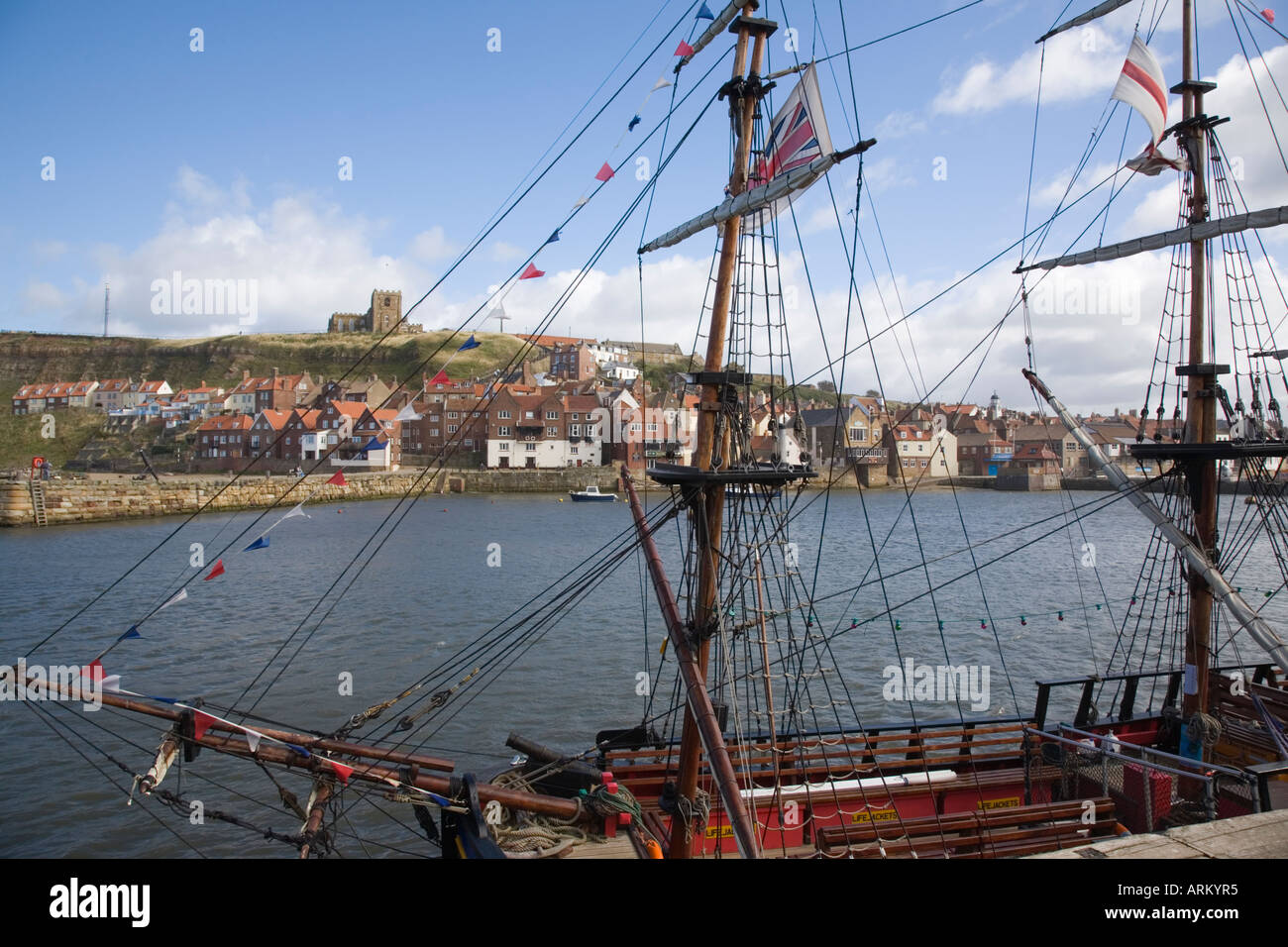 Old Port and River Esk through replica of Captain Cooks ship Bark Endeavour in Whitby, North Yorkshire, England, UK, Britain Stock Photo