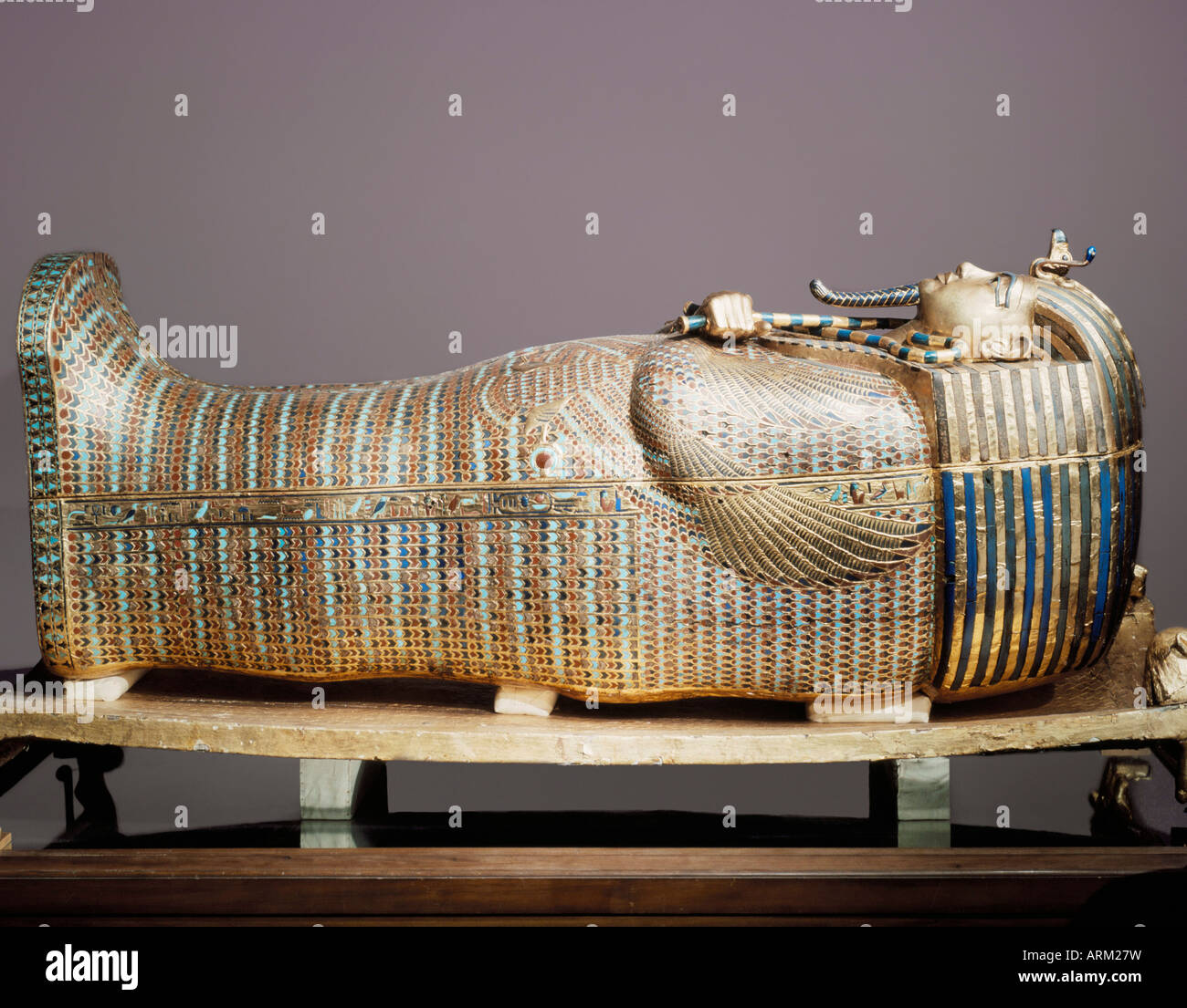 The second mummiform coffin made from gold-plated wood inlaid with glass-paste, from the tomb of the pharaoah Tutankhamun Stock Photo