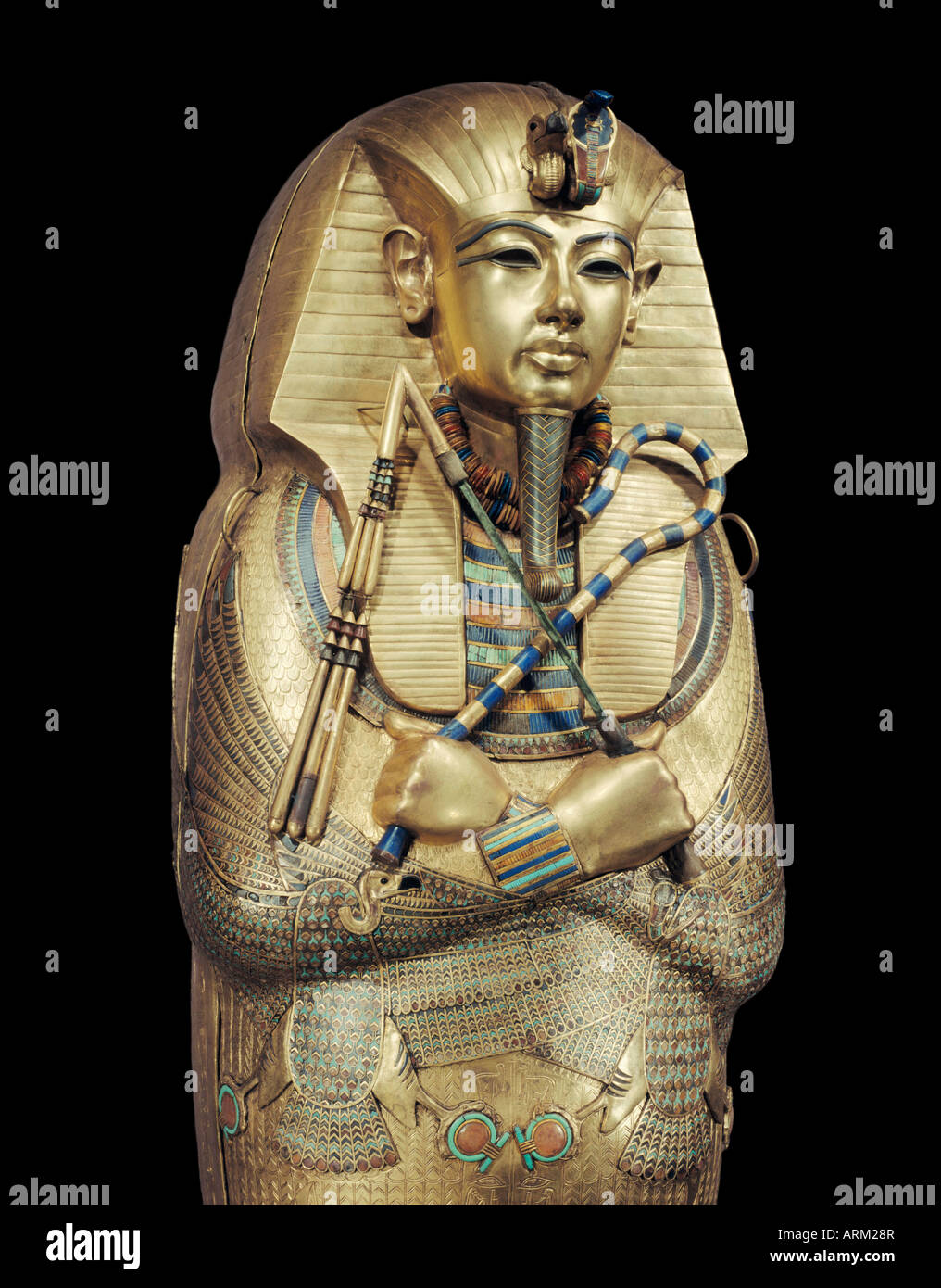 Mummiform coffin of gold with inlaid semi-precious stones, from the tomb of the pharoah Tutankhamun Stock Photo