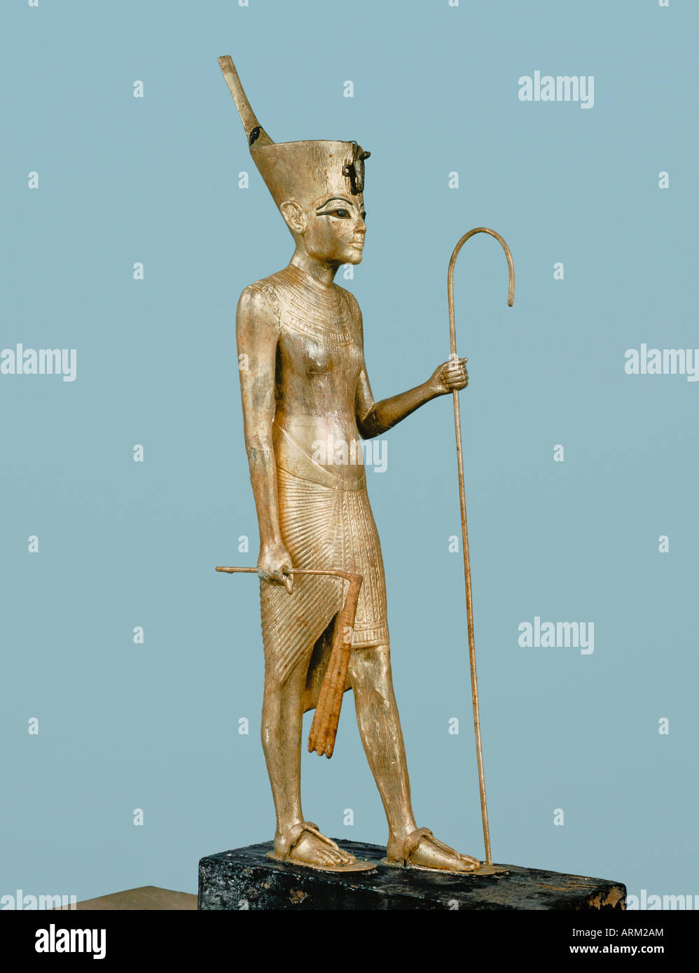 Gilt wood statuette of the king, from the tomb of the pharaoh Tutankhamun Stock Photo