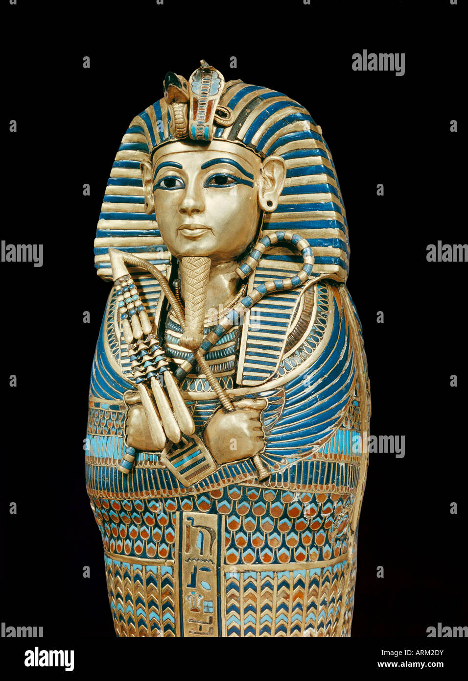 One of the four small gold mummiform coffins placed in the canopic urns, from the tomb of the pharaoh Tutankhamun Stock Photo
