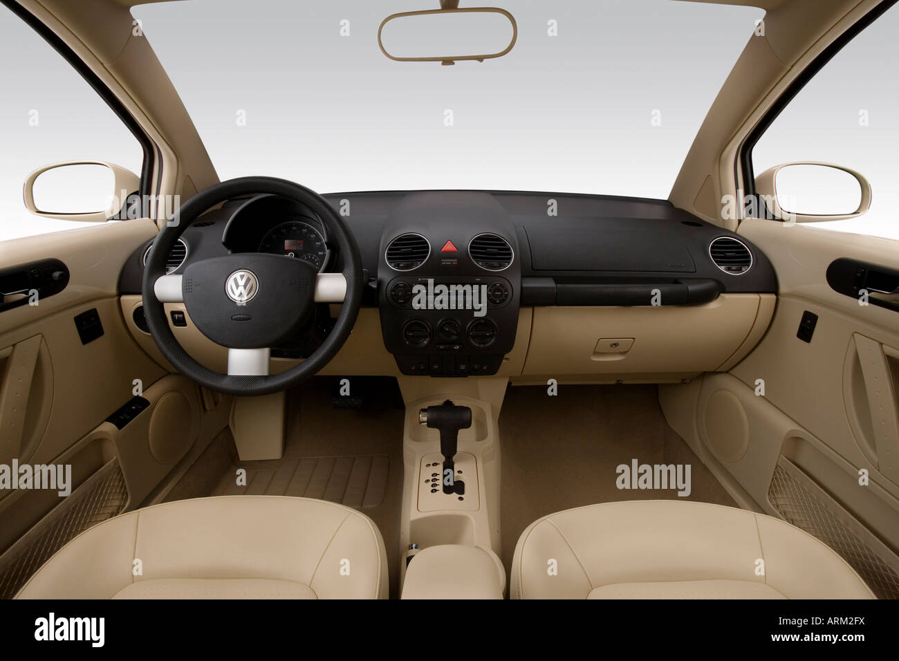 2008 Volkswagen New Beetle S in Beige - Dashboard, center console, gear  shifter view Stock Photo - Alamy