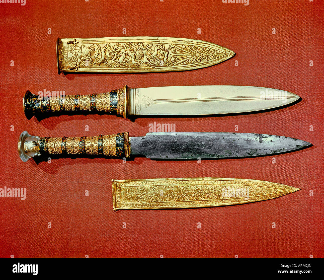 The king's two daggers, one with a blade of gold, the other of iron, from the tomb of the pharaoh Tutankhamun Stock Photo