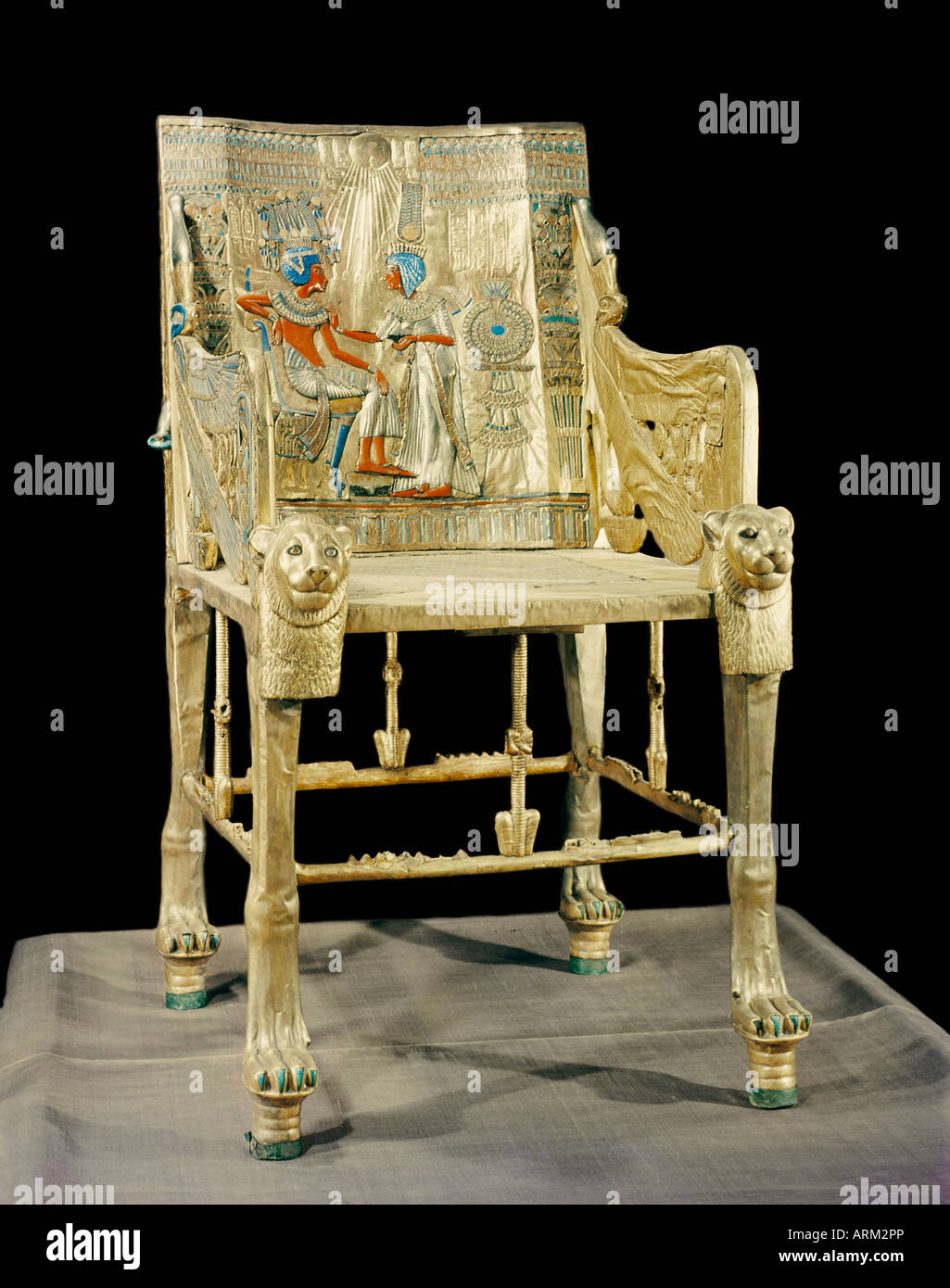 The gilt throne, the back decorated with a scene showing the royal couple, from the tomb of the pharaoh Tutankhamun Stock Photo