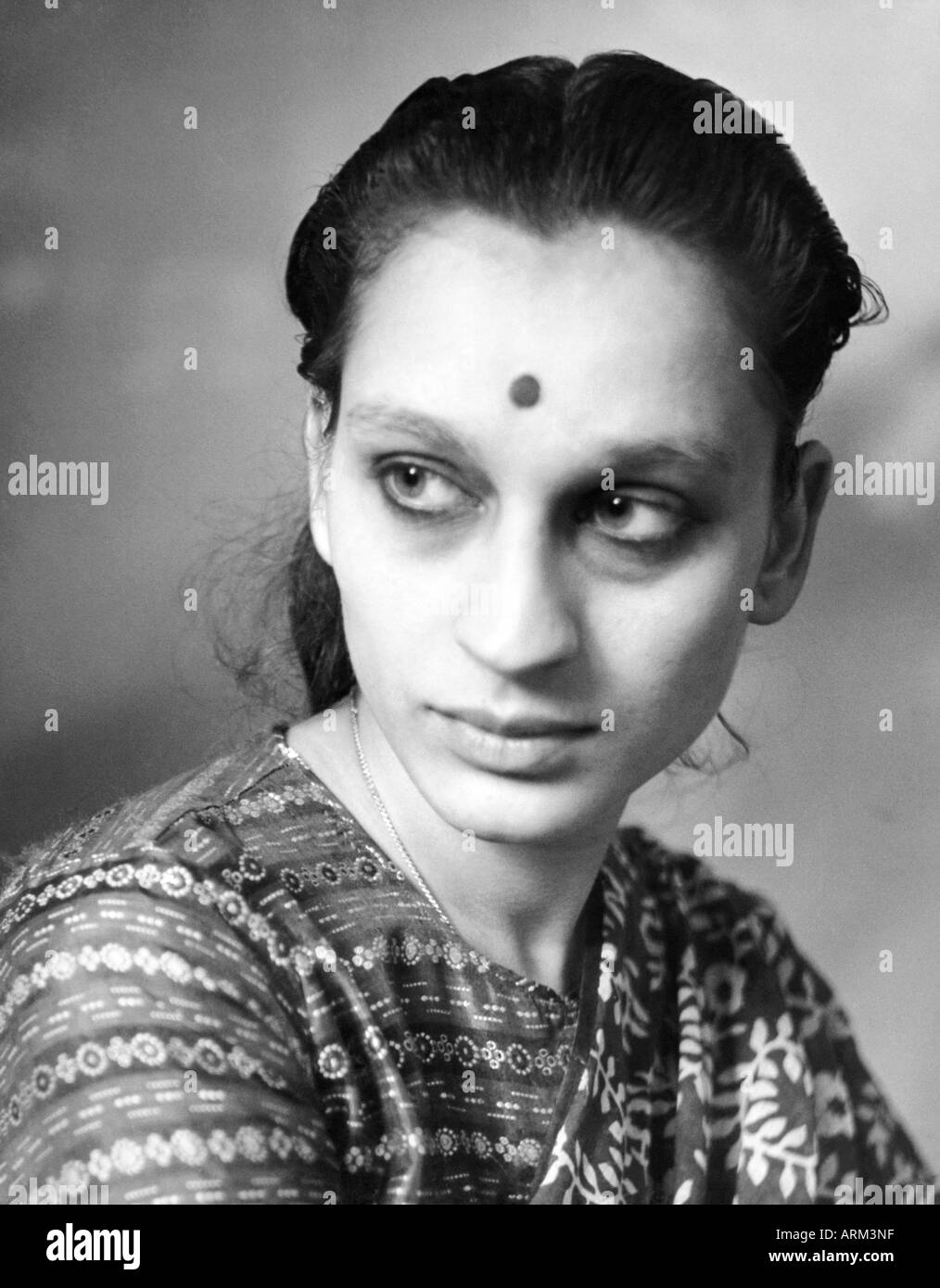 VRB101293 Indian woman in saree bindi on forehead portrait in studio Kulri Mussorie Uttar Pradesh India 1940s Stock Photo
