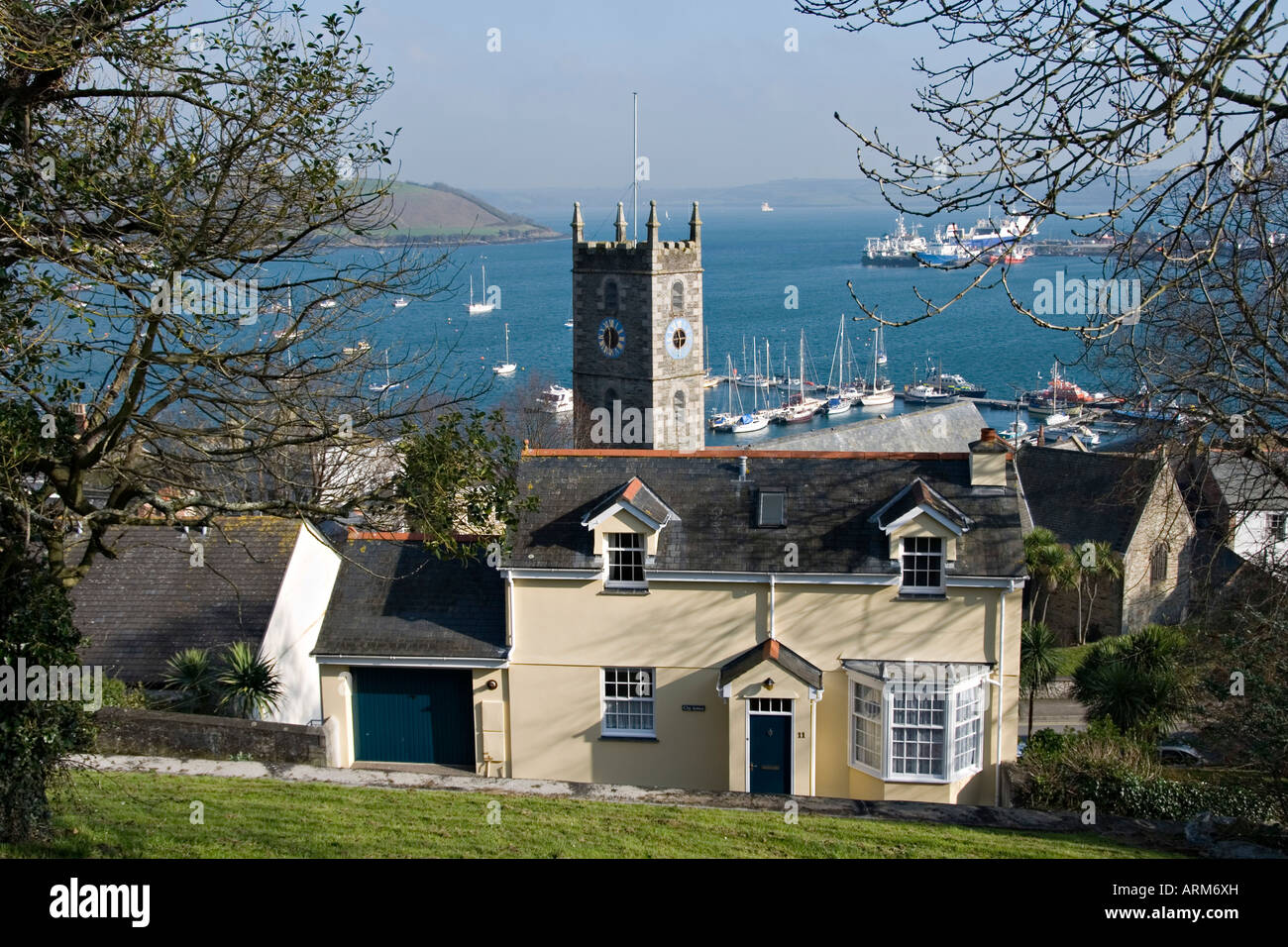 Falmouth Cornwall UK. The Church of King Charles the Martyr, 1665, with Carrick Roads (the River Fal estuary) in the background Stock Photo