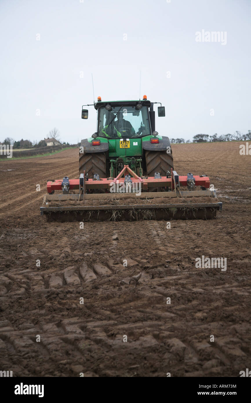 Tractor harrowing field Butley Suffolk England Stock Photo - Alamy