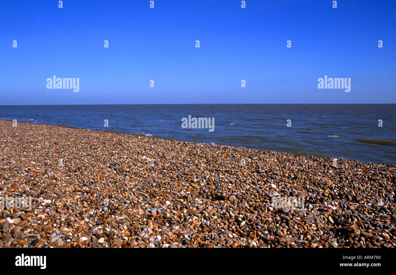 Image divdied into three sections blue sky sea shingle beach Stock ...