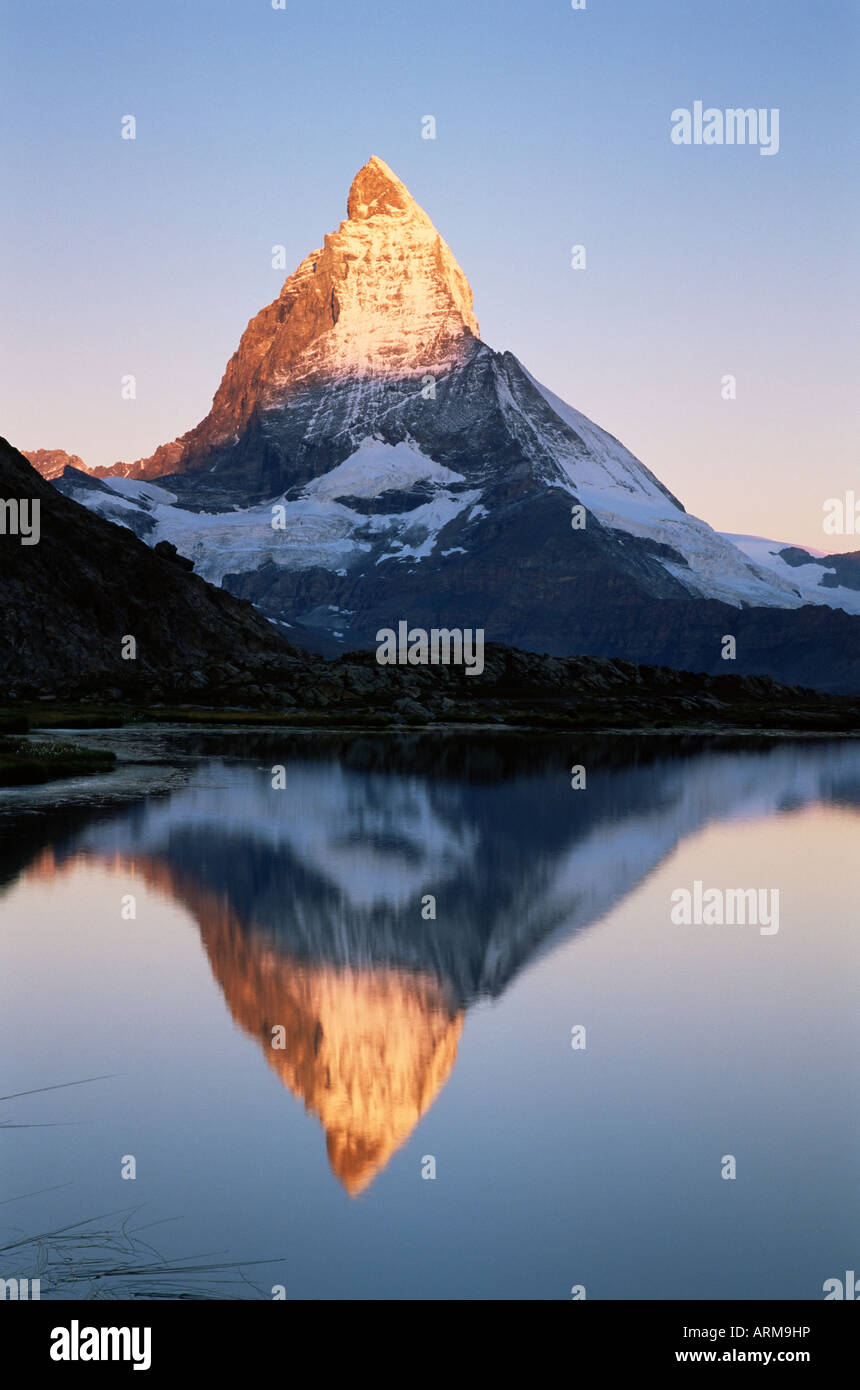 Matterhorn from Riffelsee at dawn, Zermatt, Swiss Alps, Switzerland, Europe Stock Photo