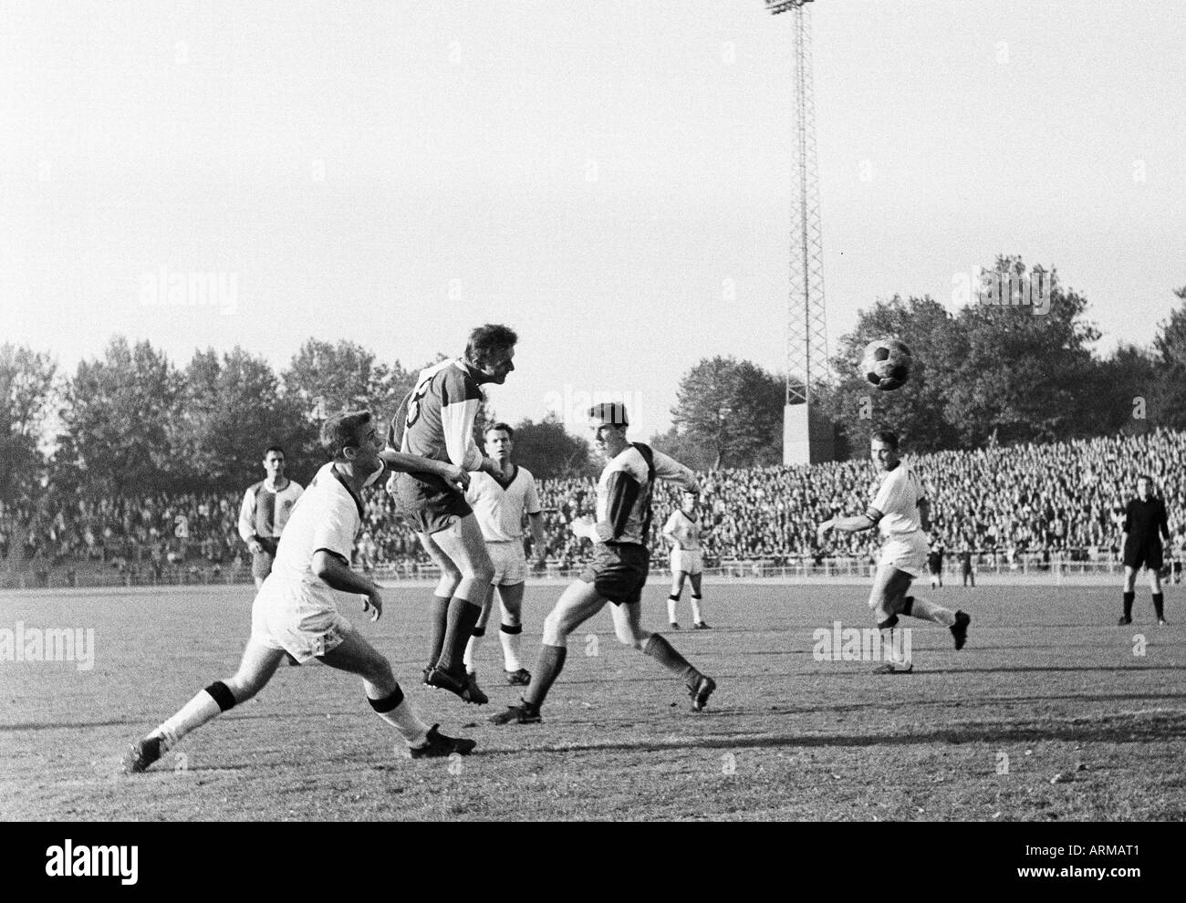 football, WFV Cup, 1965/1966, Fortuna Duesseldorf versus ETB Schwarz-Weiss Essen 1:0, Rhine Stadium in Duesseldorf, scene of the match, f.l.t.r. Peter Meyer (Ddorf), Guenter Leufgen (ETB), Reinhold Straus (Ddorf), Willi Ridder (ETB), Waldemar Gerhardt (Dd Stock Photo