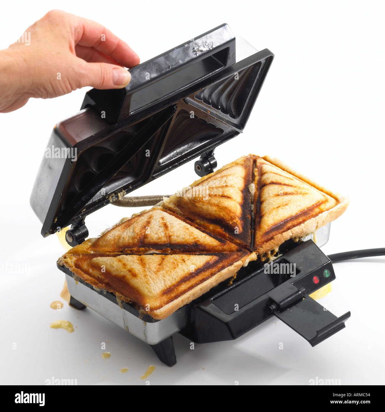 Breville Sandwich toaster lid lifted to show cooked sandwich Keywords
