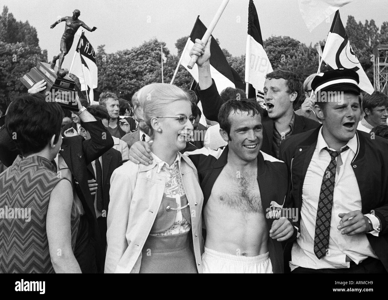 football, German Amateur Championship 1969, final, SC Juelich 1910 versus SpVgg Erkenschwick 2:1, Grotenburg Stadium in Krefeld-Uerdingen, football players and football fans of SC Juelich rejoicing at the title win, pictured player Heinz Osenberg (middle) Stock Photo