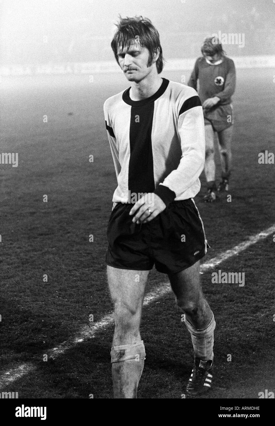 football, Regionalliga West, 1973/1974, Niederrhein Stadium in Oberhausen, Rot-Weiss Oberhausen versus Borussia Dortmund 2:1, football player leaves the pitch, Peter Czernotzky (BVB) Stock Photo