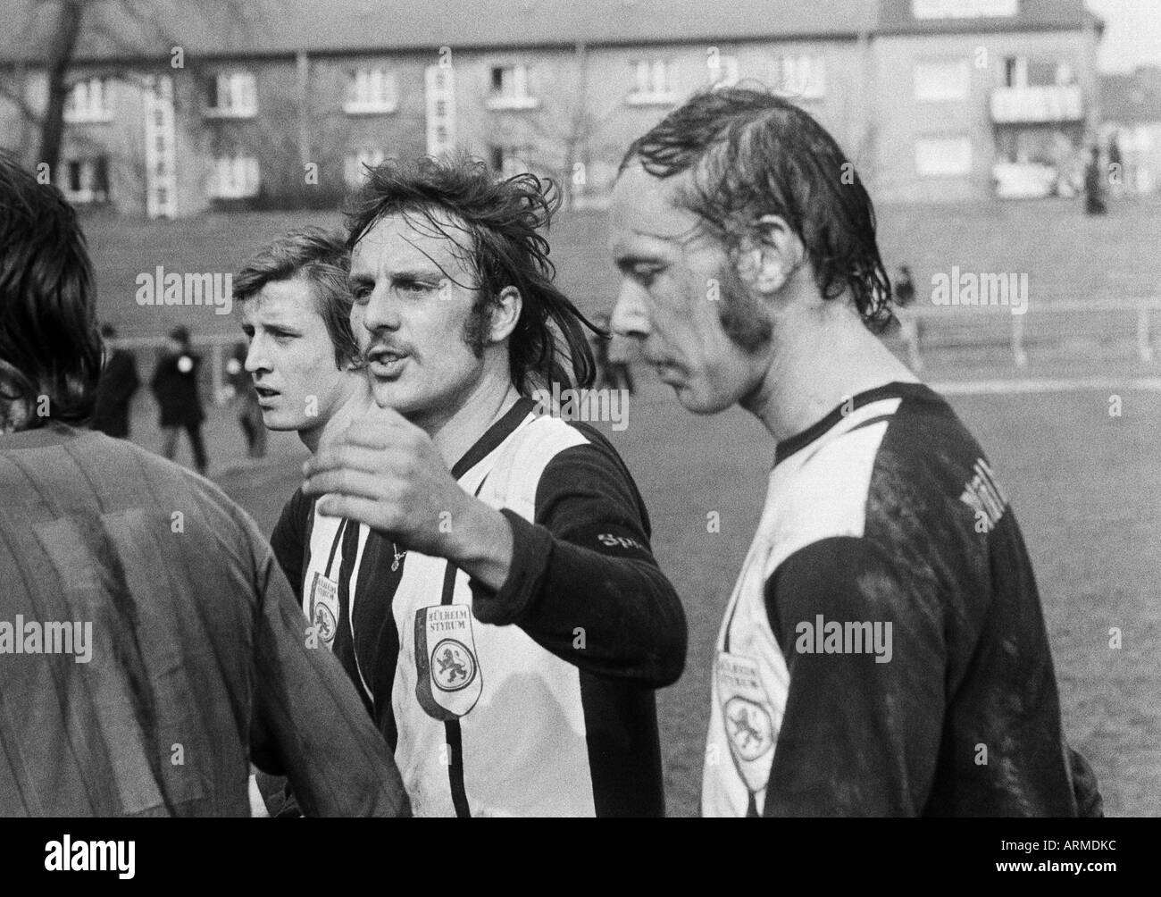 football, Regionalliga West, 1973/1974, Eintracht Gelsenkirchen versus 1. FC Muelheim 4:2, Sued Stadium Gelsenkirchen, football players leave the pitch, f.l.t.r. Hartmut Limpert (Muelheim), Ernst Bachmann (Muelheim), Heiko Mertes (Muelheim) Stock Photo