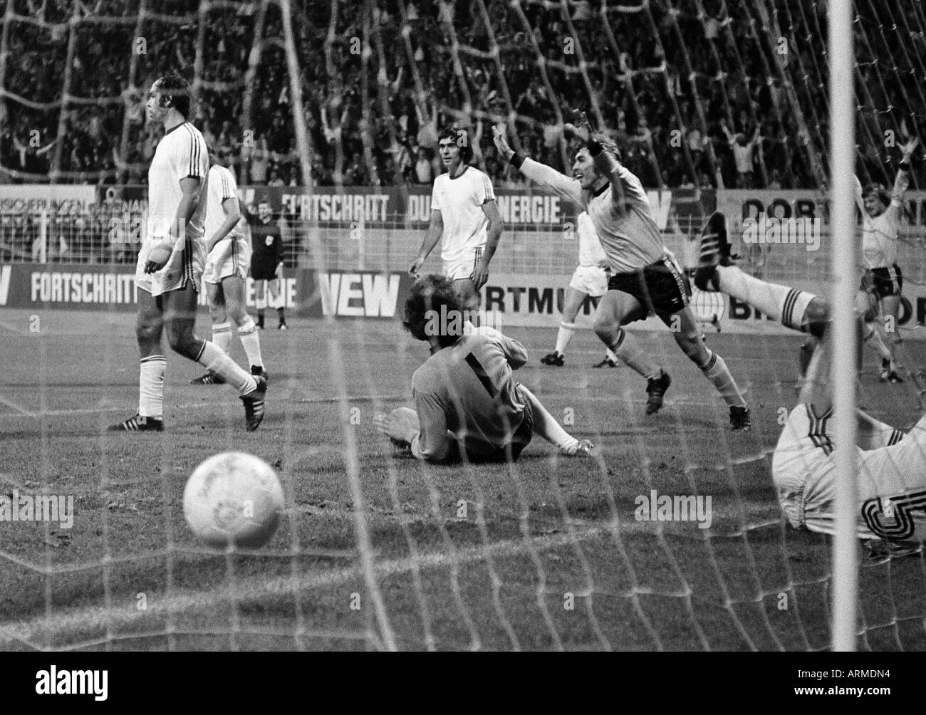 football, second Bundesliga North, 1974/1975, Borussia Dortmund versus Rot-Weiss Oberhausen 4:0, Westfalen Stadium in Dortmund, scene of the match, goal to Dortmund, f.l.t.r. Hermann Josef Wilbertz (RWO), keeper Dieter Ferner (RWO), Stojan Vukasinovic (RW Stock Photo