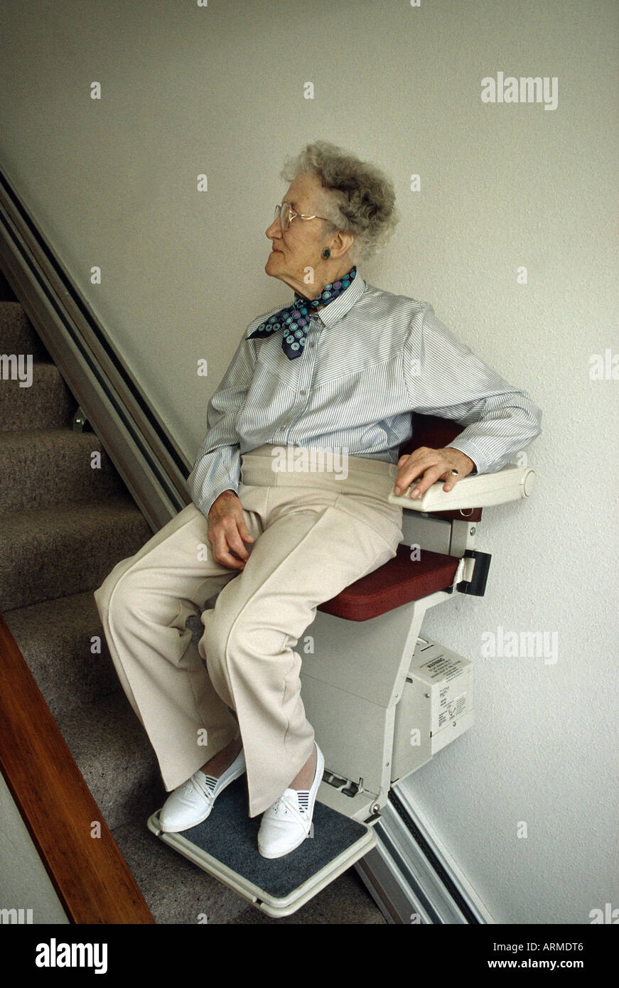 Old woman chair lift hi-res stock photography and images - Alamy