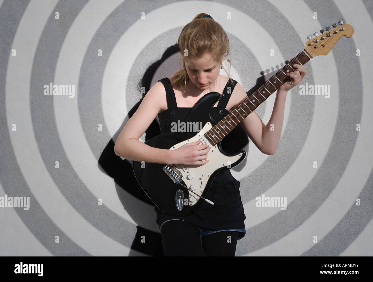 girl playing electric guitar Stock Photo - Alamy