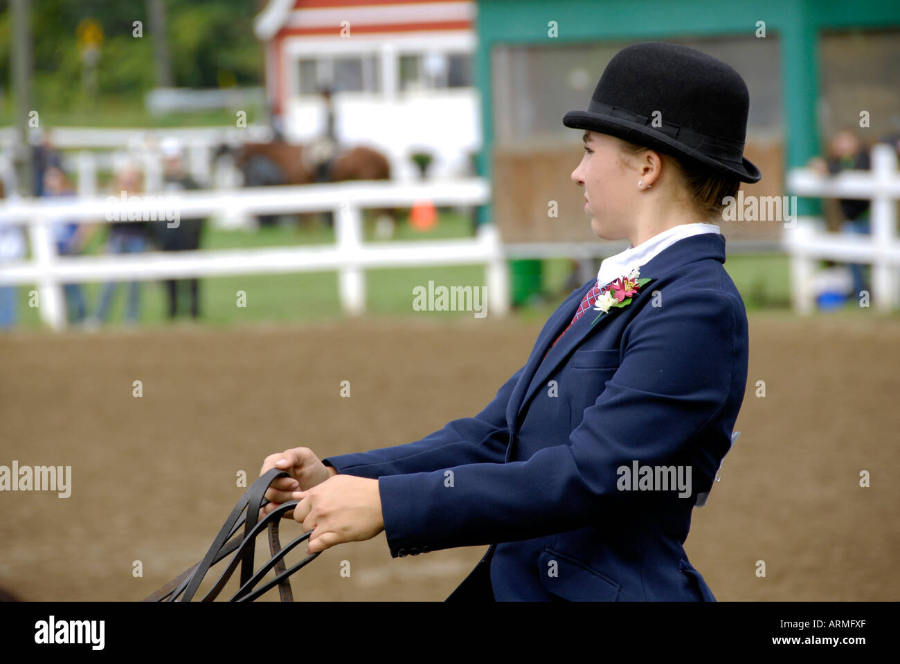 High school female student competes in equestrian event Stock Photo Alamy