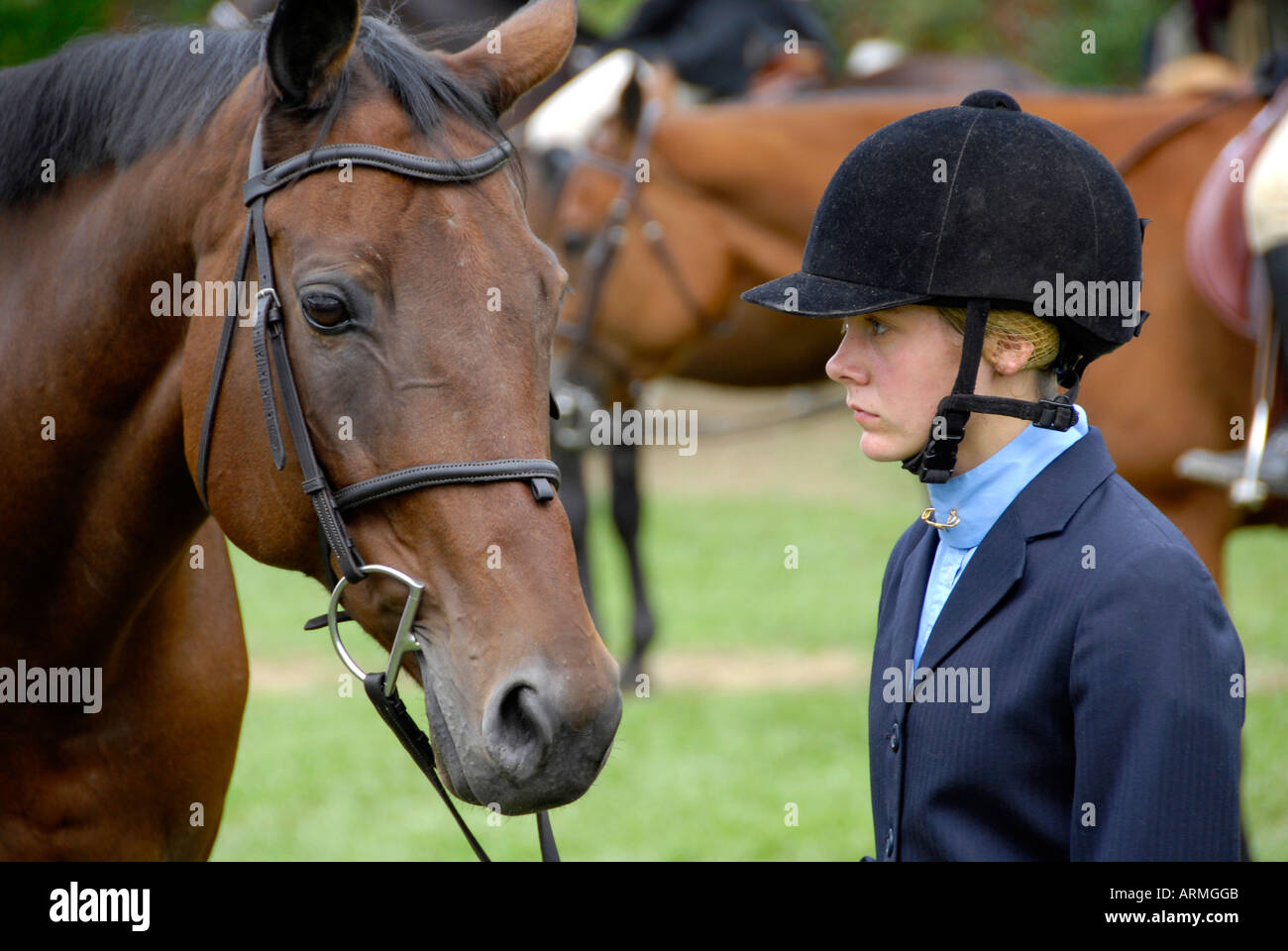 High school female student competes in equestrian event Stock Photo