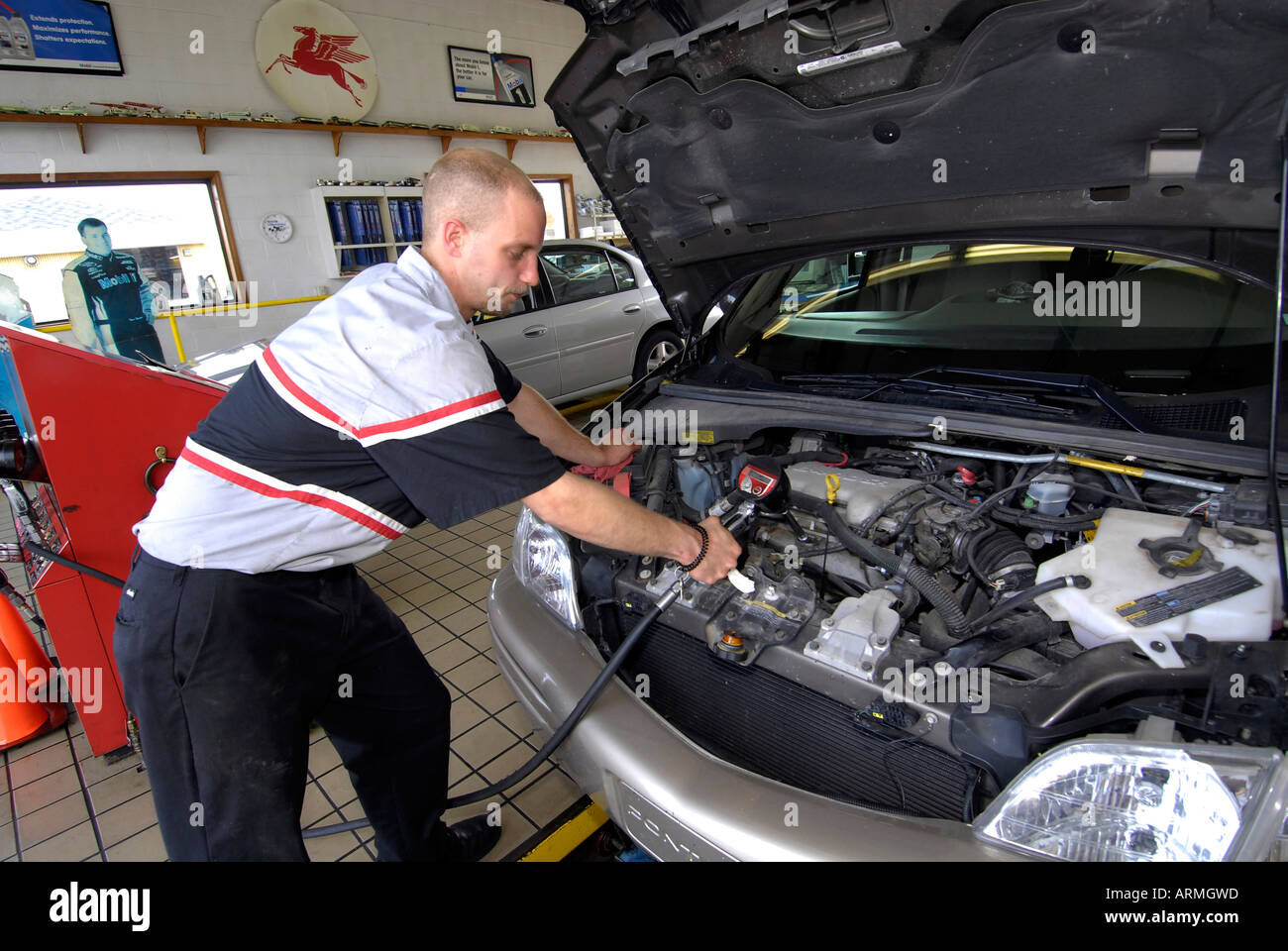 Quick oil change garage where drive in customers have oil changed in