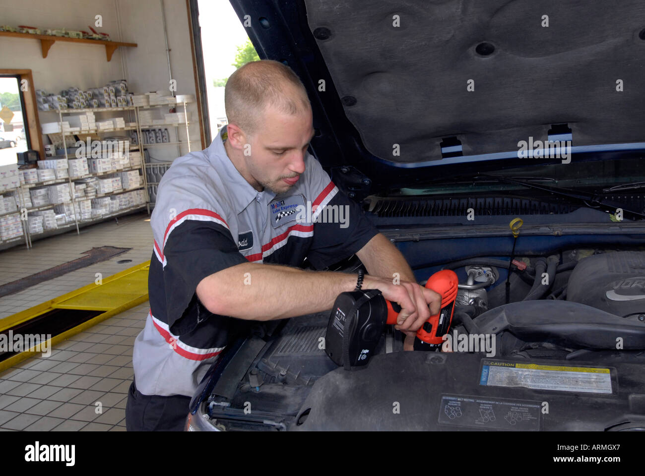 Quick oil change garage where drive in customers have oil changed in