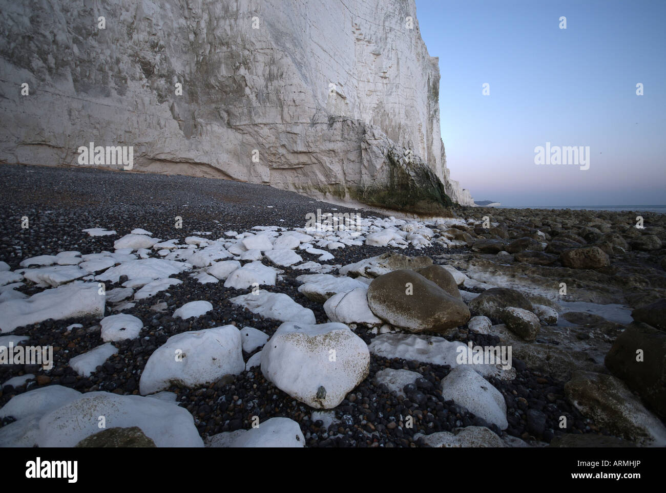 The base of the Seven Sisters cliffs with chalk boulders which have dropped to the floor due to the cliffs natural erosion Stock Photo