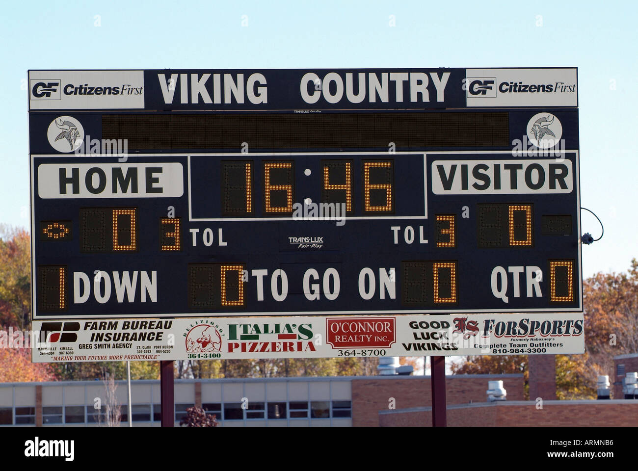 Football game with scoreboard indication the score and time left in a period Stock Photo