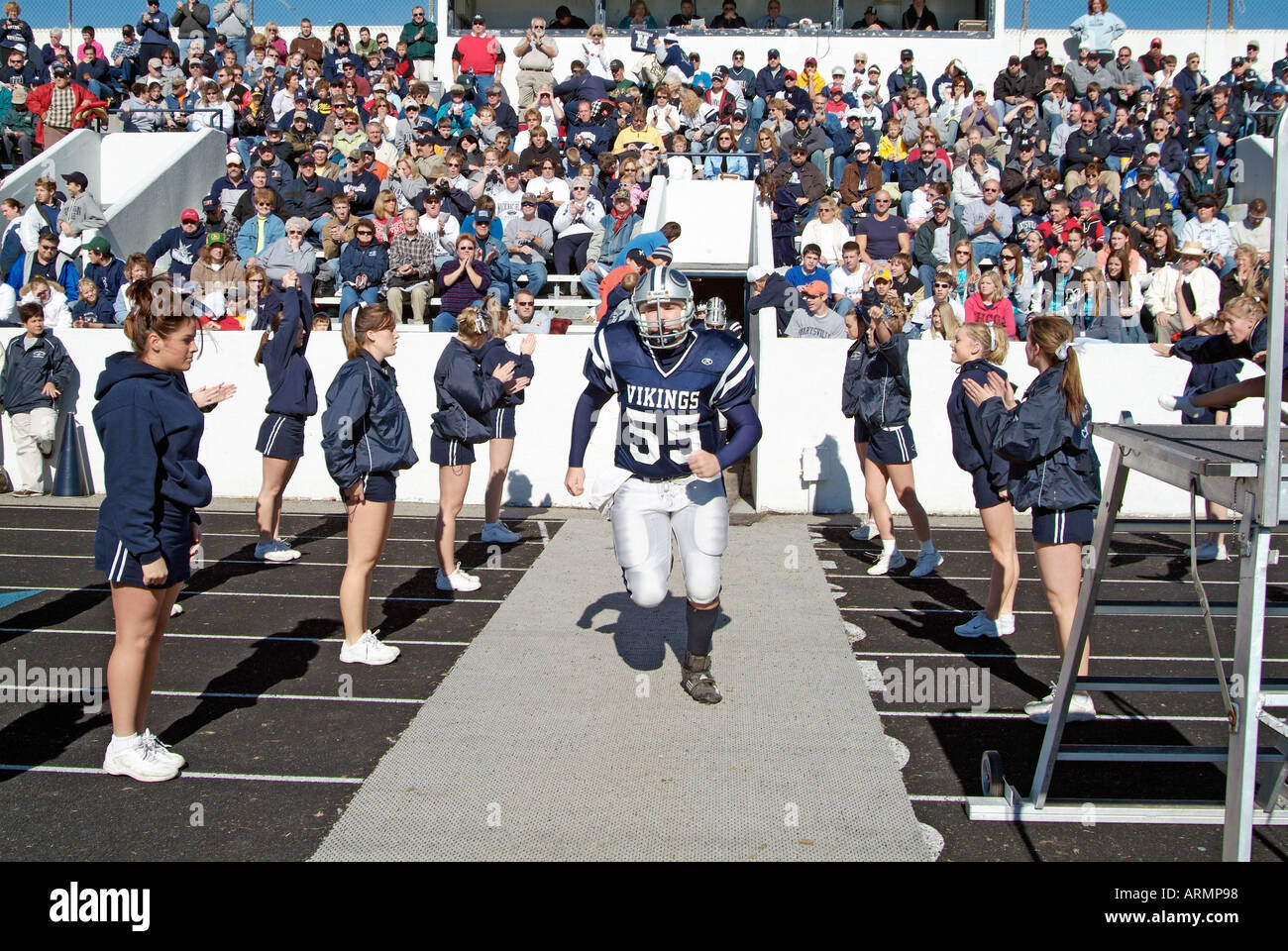 Players running onto field hires stock photography and images Alamy