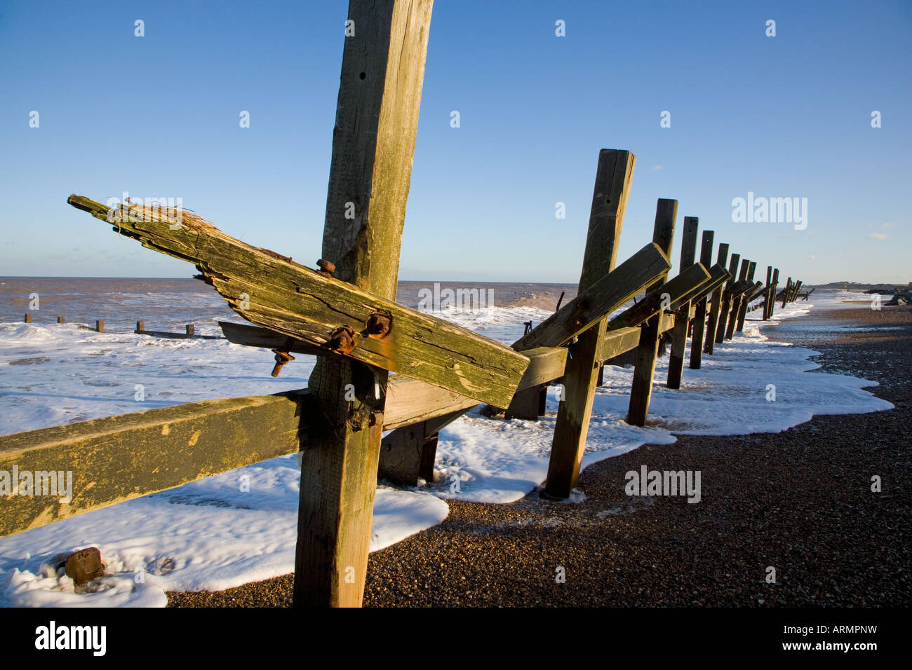 Broken Groynes Happisburgh Norfolk UK Winter Stock Photo