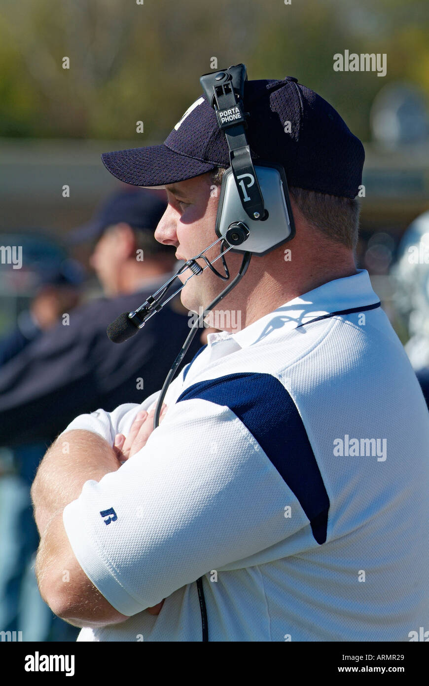 High school football coach communicate with other coaches by way of