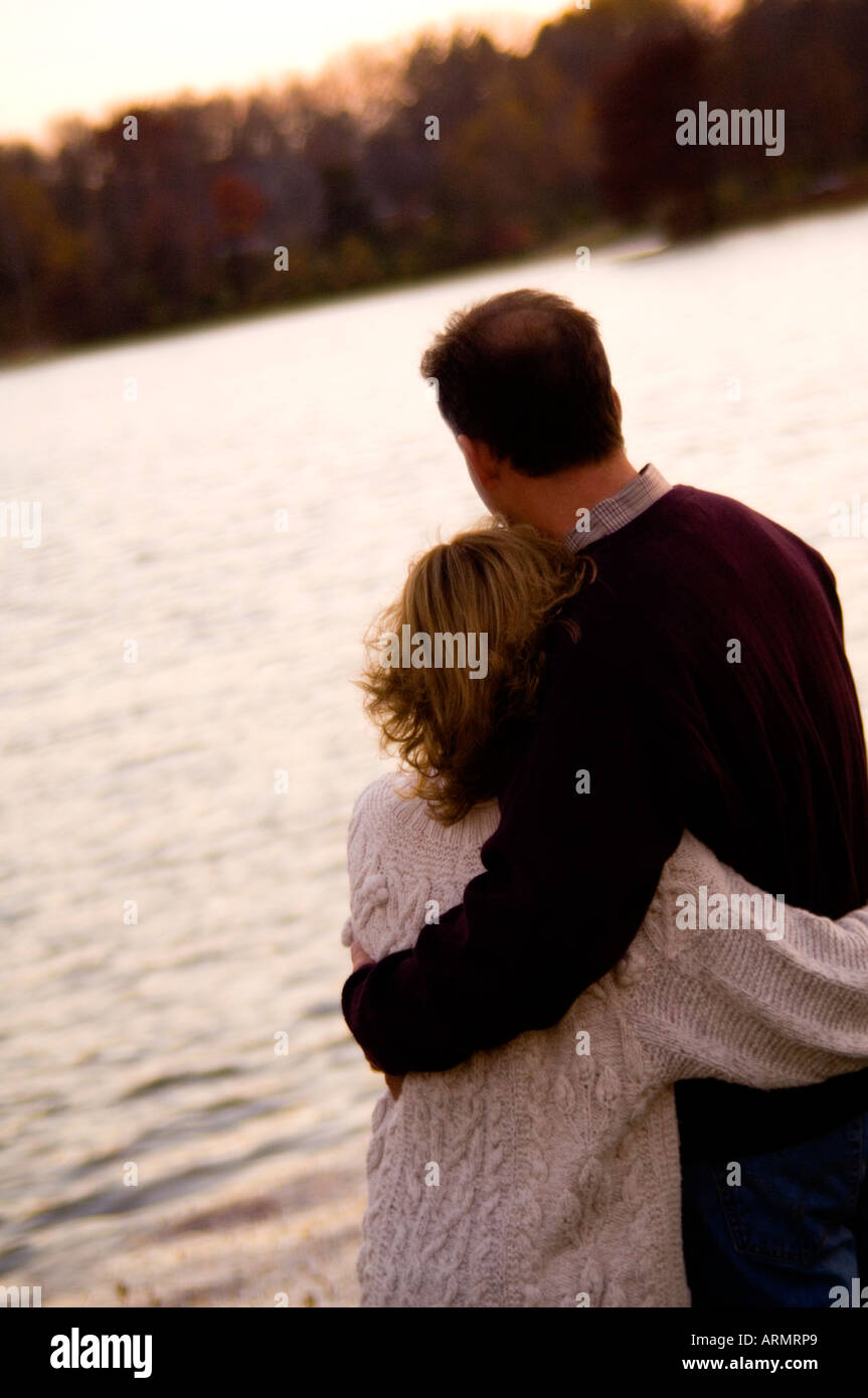 Hugging couple on lake hi-res stock photography and images - Alamy