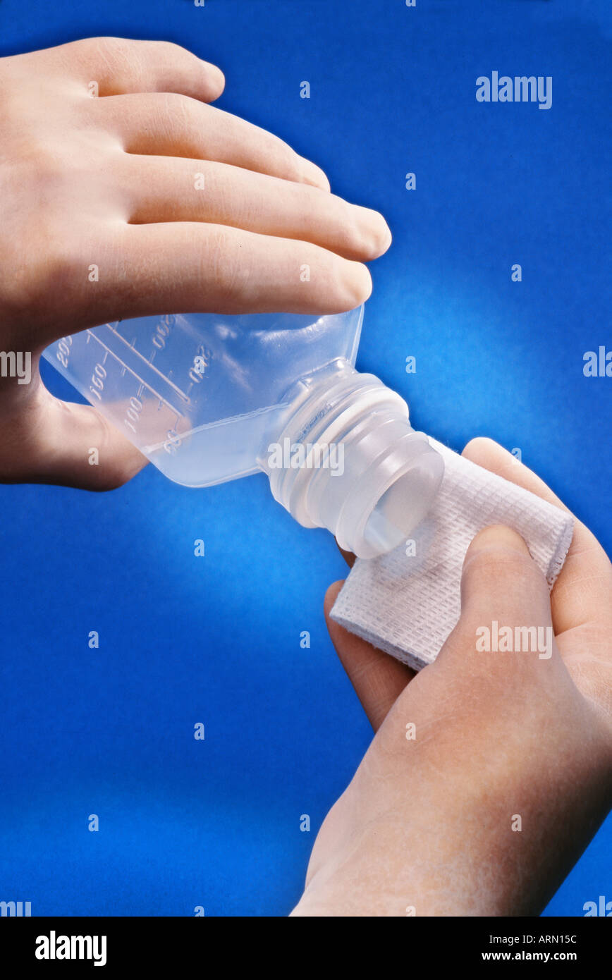 pouring liquid medicine from plastic bottle Stock Photo Alamy