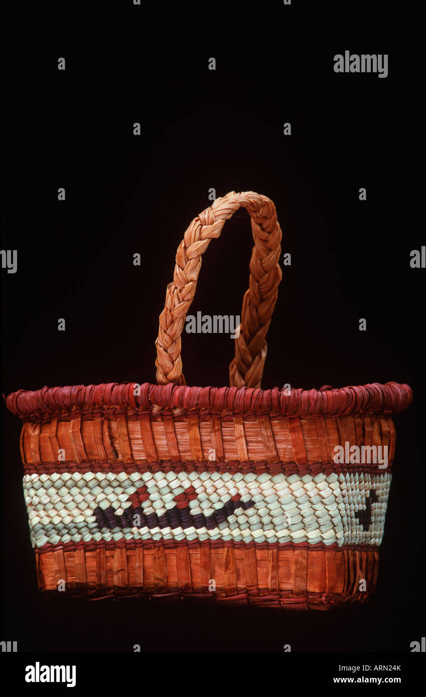 Nu-Chah-nulth whaling motif on woven basket, British Columbia, Canada. Stock Photo