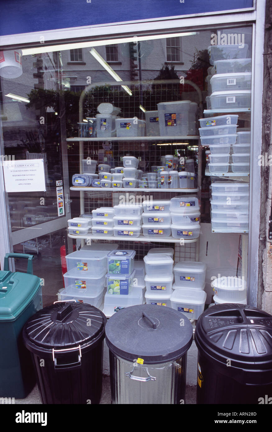 Hardware Shop Window with rubbish bins and plastic storage