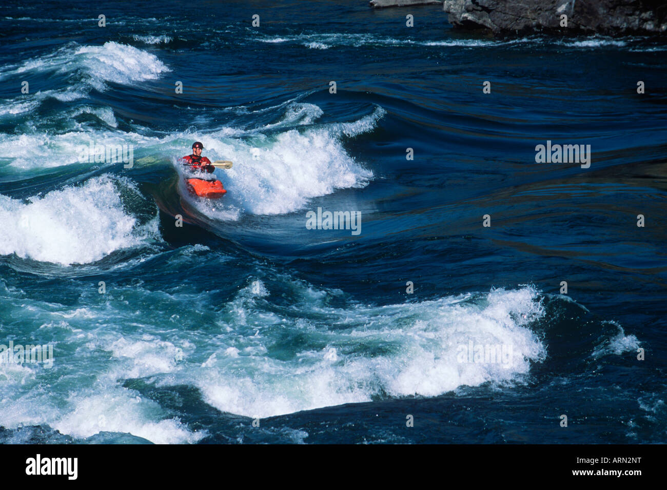 Thompson River kayakers near Lytton, British Columbia, Canada. Stock Photo
