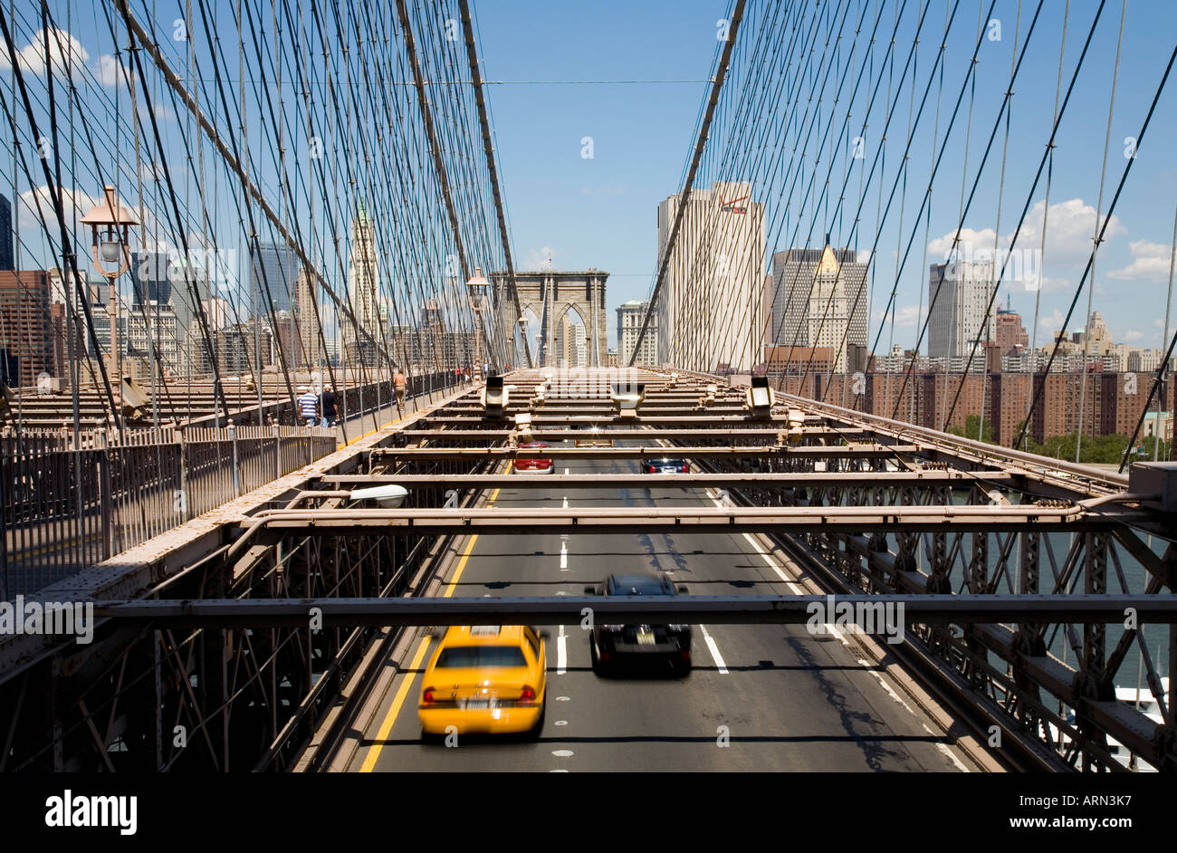 The traffic and cars on the Brooklyn Bridge, New York, USA. Brooklyn