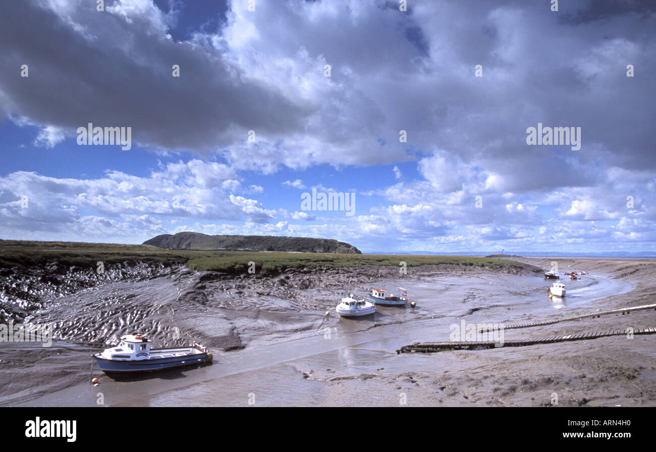 Boats in the Mouth of the river Axe Weston Bay Severn Estuary protected area North Somerset England Stock Photo