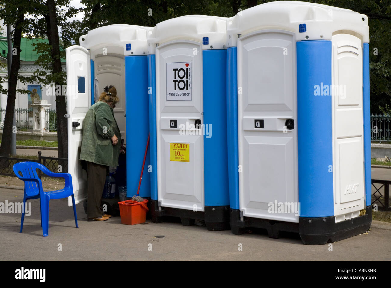 Cleaning portable public toilets Moscow Russia Eastern Europe Stock Photo