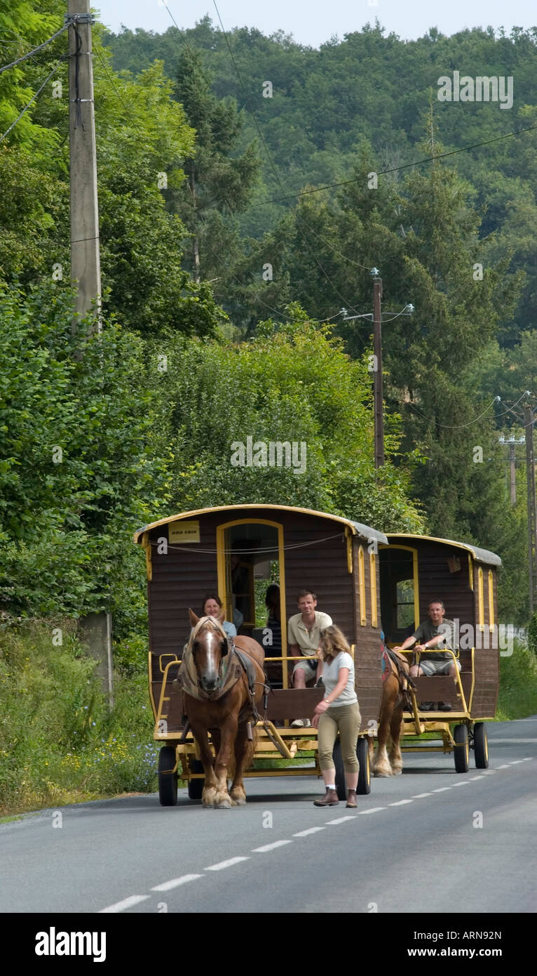 horse drawn gipsy type caravans in france for holidays Stock Photo Alamy