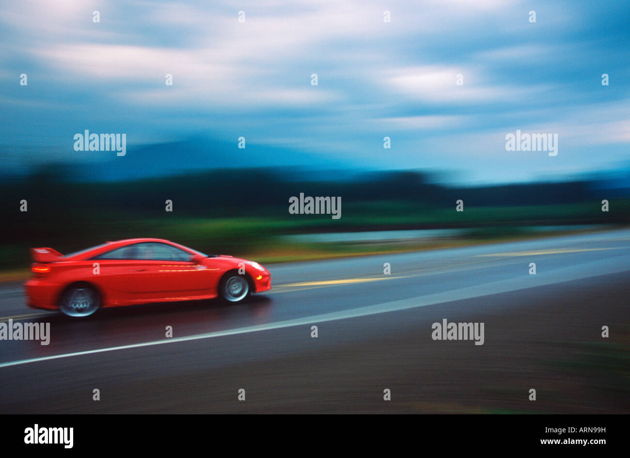 Red sports car road hi-res stock photography and images - Alamy