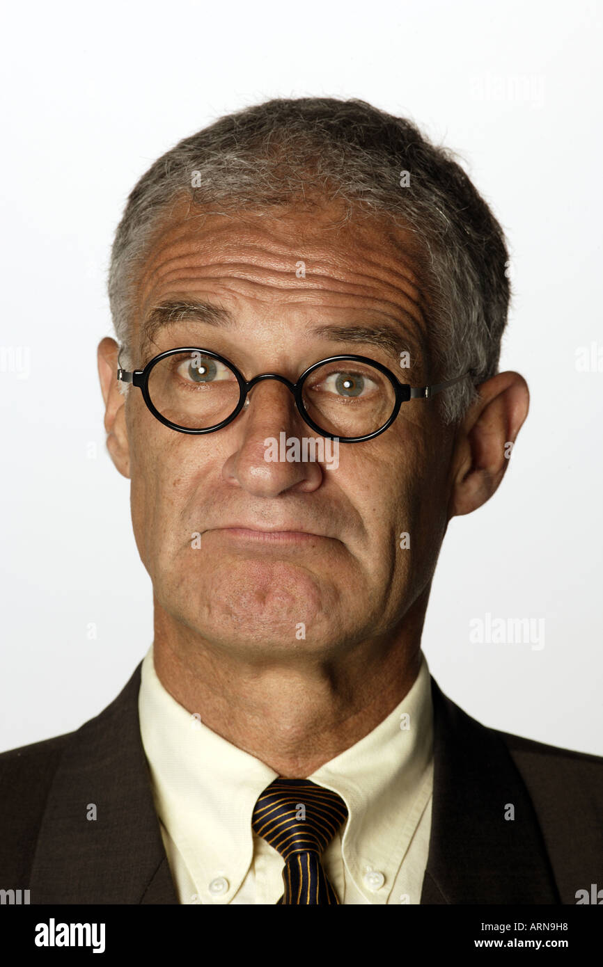 Faces Businessman looking skeptical Stock Photo