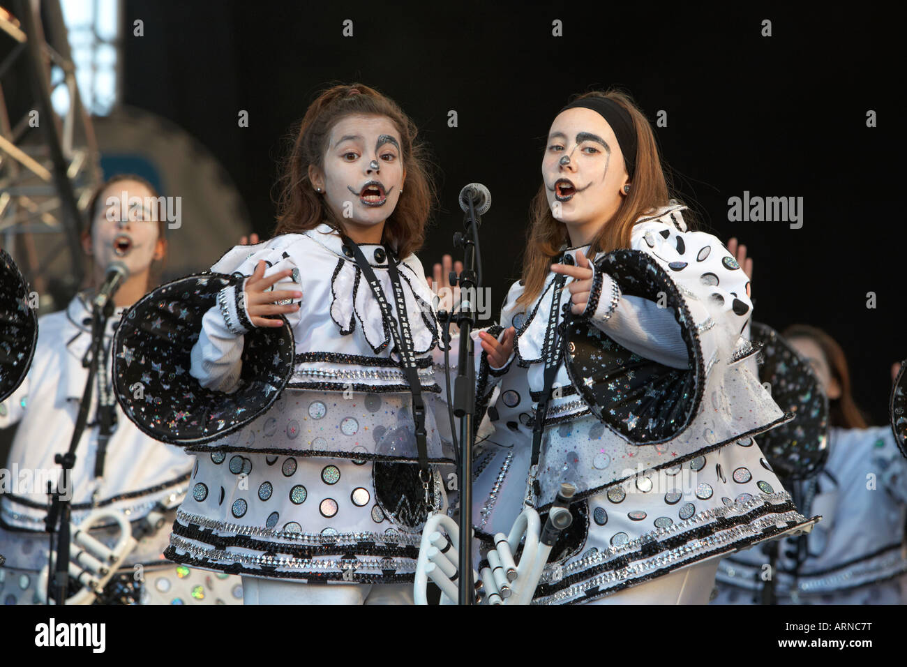 two young teenage girls in costume perform on the big stage at the carnaval  in santa cruz de tenerife canary islands spain Stock Photo - Alamy